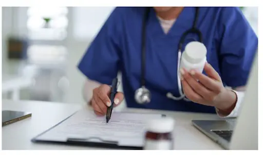 Medication being assessed by a medical professional