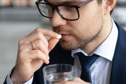 A man happy to take medication after learning the risks and benefits of methadone vs Suboxone